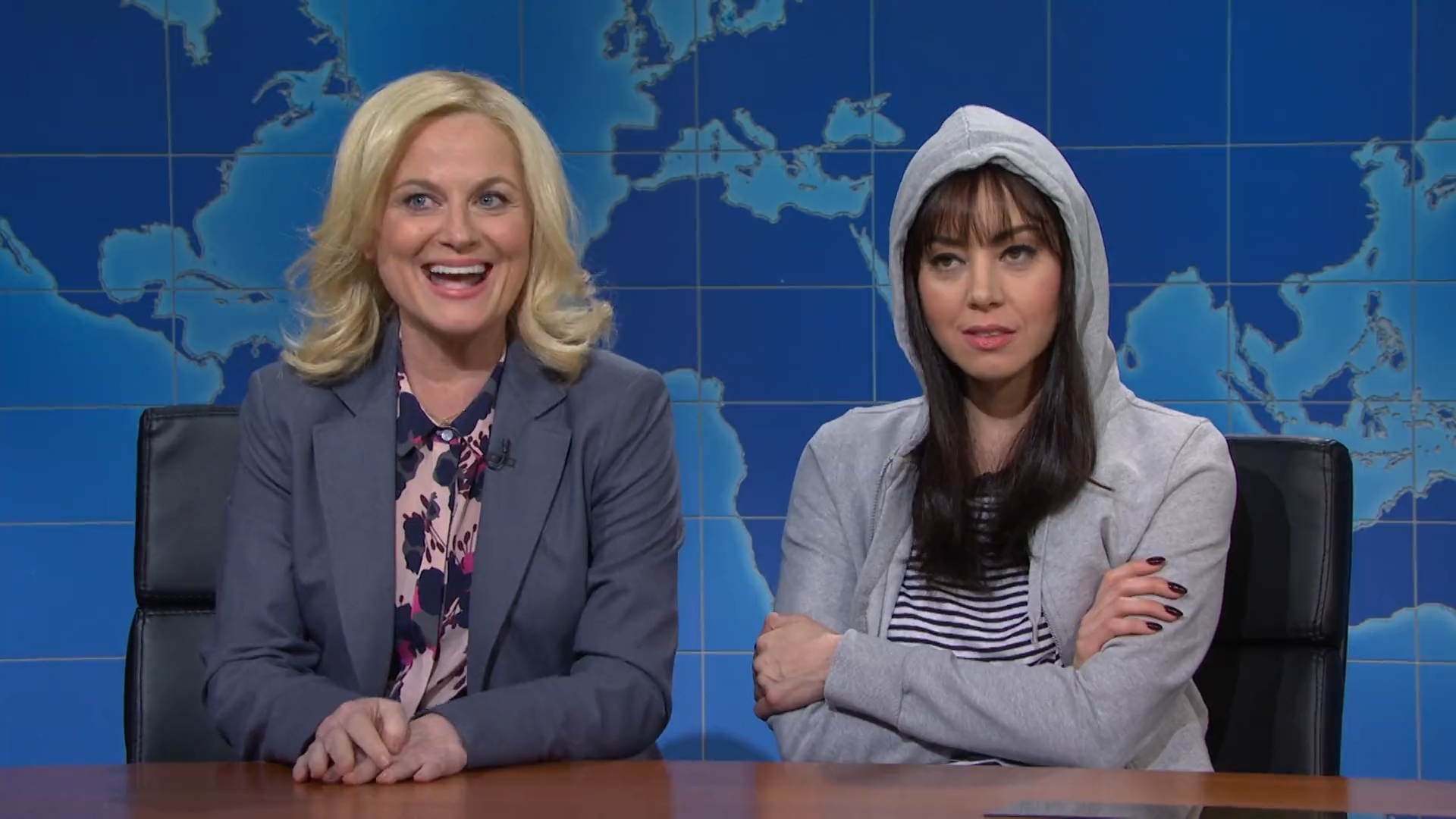 Leslie Knope and April Ludgate (Amy Poehler and Aubrey Plaza) on Saturday Night Live Weekend Update