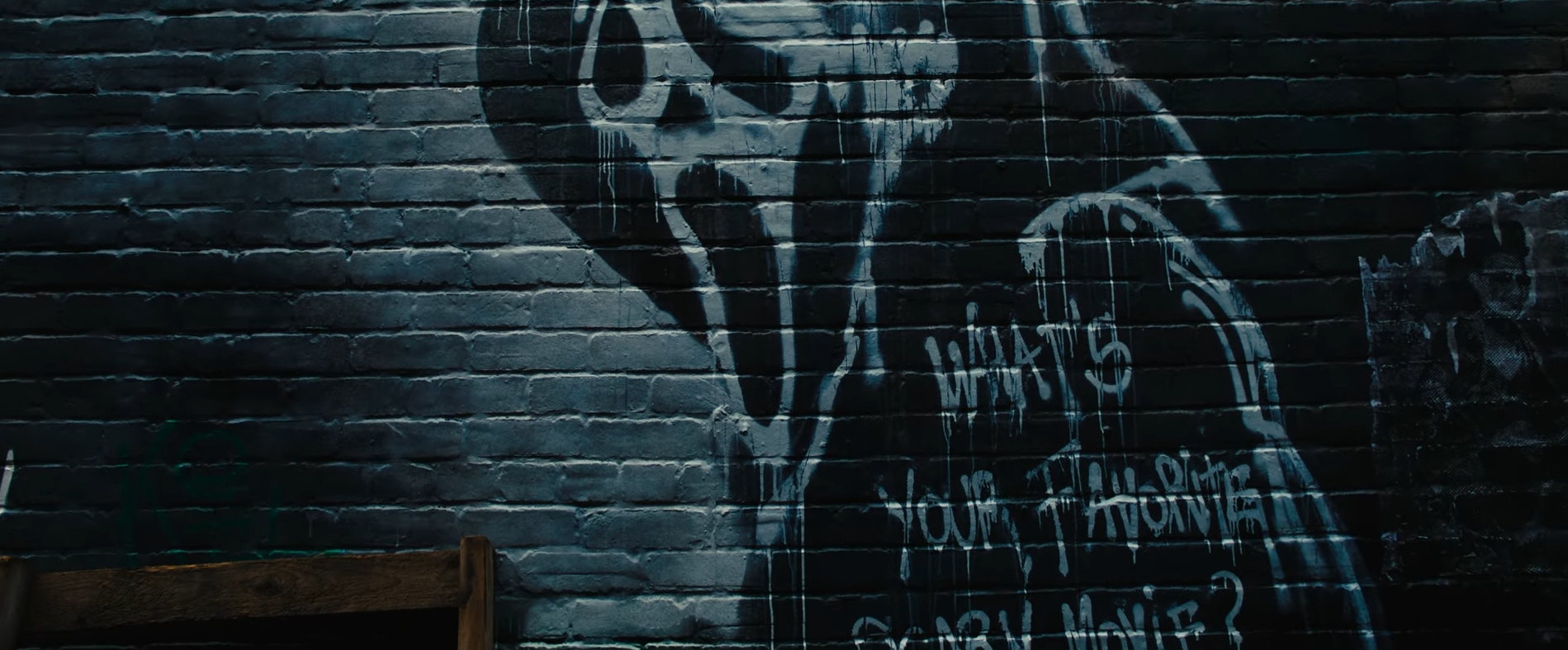 Ghostface "WHAT'S YOUR FAVORITE SCARY MOVIE" graffiti from Scream VI trailer. Courtesy of Paramount Pictures/ Spyglass Media Group/YouTube