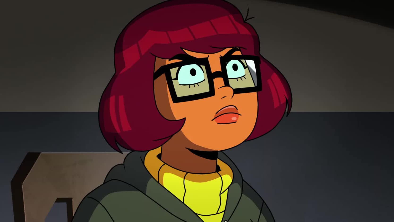 Velma from HBO Max series season 1 staring at dumpster fire that will be season 2