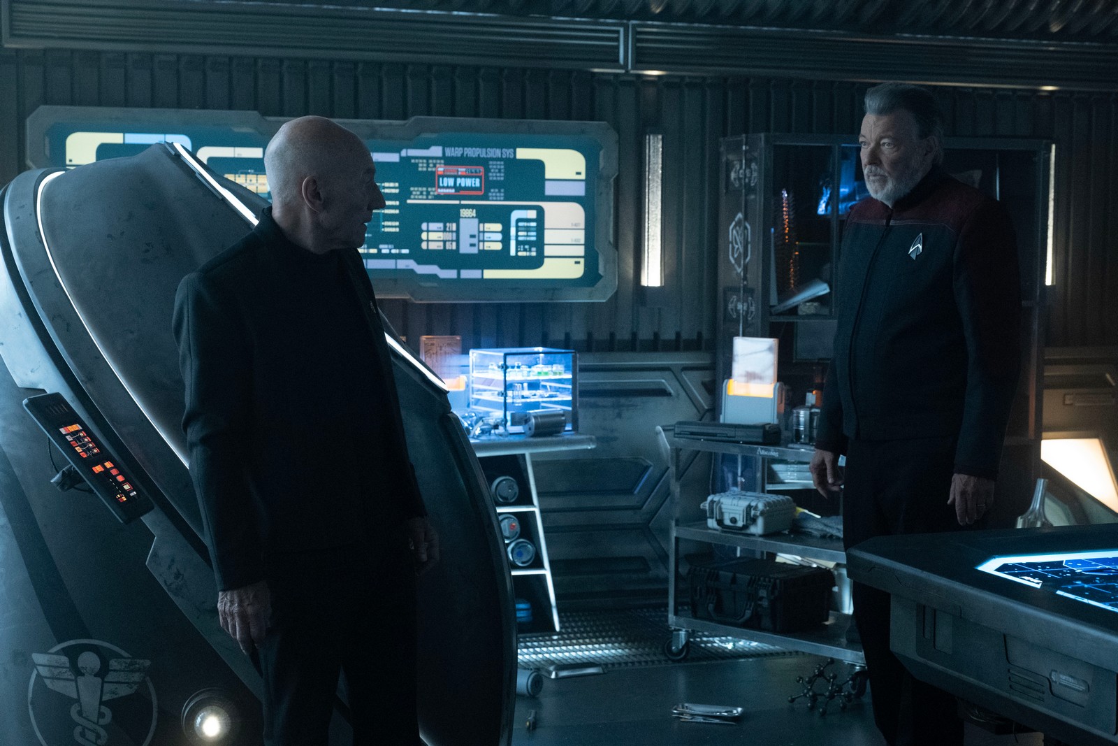 Sir Patrick Stewart as Jean-Luc Picard and Jonathan Frakes as Captain Riker in Star Trek: Picard 3x02 "Disengage."