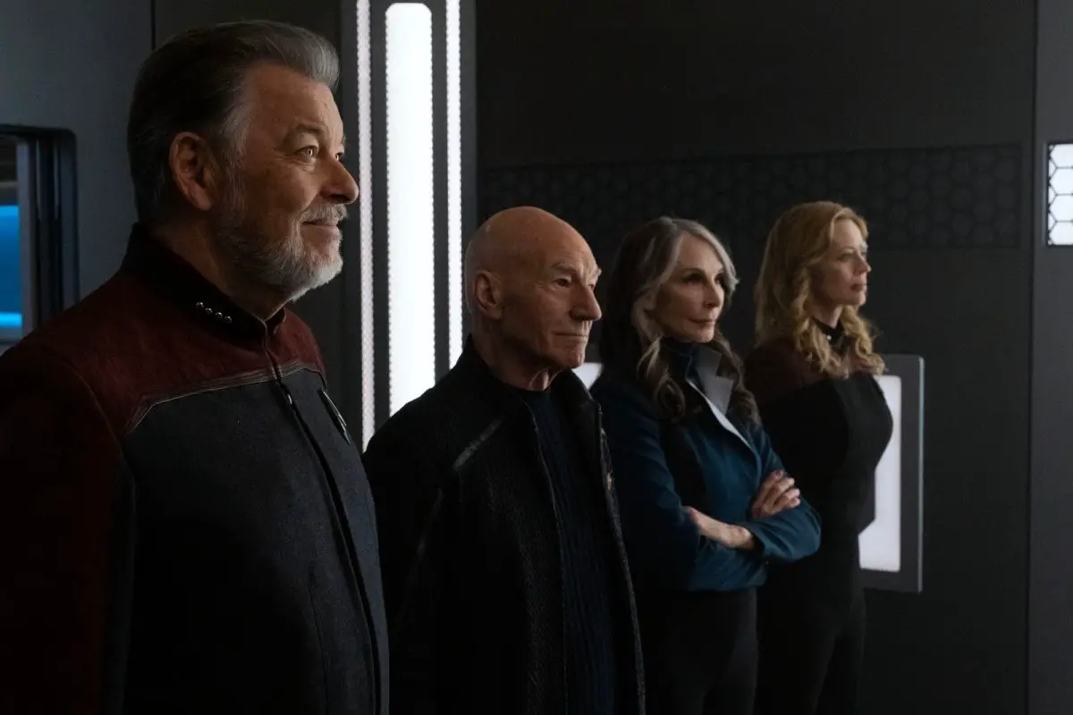 Jonathan Frakes as William Riker, Sir Patrick Stewart as Jean-Luc Picard, Gates McFadden as Dr. Beverly Crusher, and Jeri Ryan as Seven of Nine in Star Trek: Picard.