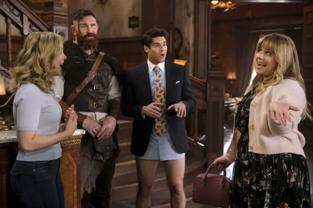 “The Heir” – When a woman shows up claiming to be the rightful heir to Woodstone Mansion, Sam (Rose McGiver) and Jay (Utkarsh Ambudkar) enlist the help of a lawyer. Meanwhile, Isaac (Brandon Scott Jones) tries to decide how to spend half of Sam’s advance on his autobiography. Also, a surprise event takes place that could dramatically change life at the manor. Pictured (L-R): Rose McIver as Samantha, Devan Chandler Long as Thorfinn, Asher Grodman as Trevor, and Jessie Ennis as Kelsey. Photo: Bertrand Calmeau/CBS ©2023 CBS Broadcasting, Inc. All Rights Reserved.