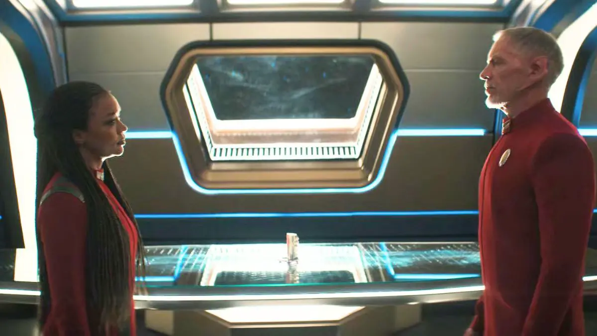 Sonequa Martin-Green as Captain Michael Burnham and Callum Keith Rennie as Commander Rayner in Star Trek: Discovery 5x04 "Face the Strange"