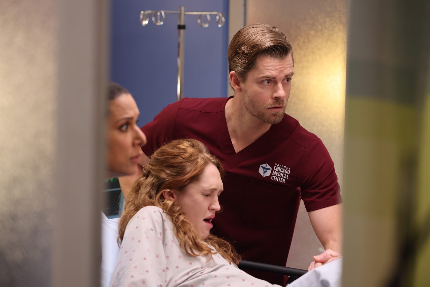 Dr. Mitch Ripley helps a patient in Chicago Med