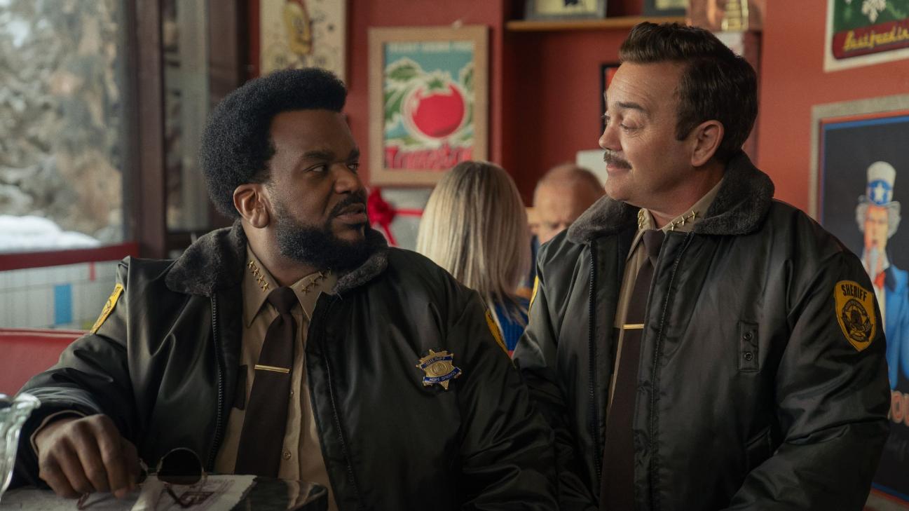 Hot Frosty (L-R) Craig Robinson as Sheriff Nathaniel Hunter and Joe Lo Truglio as Deputy Sheriff Ed Schatz in Hot Frosty. Cr. Petr Maur / Netflix © 2024
