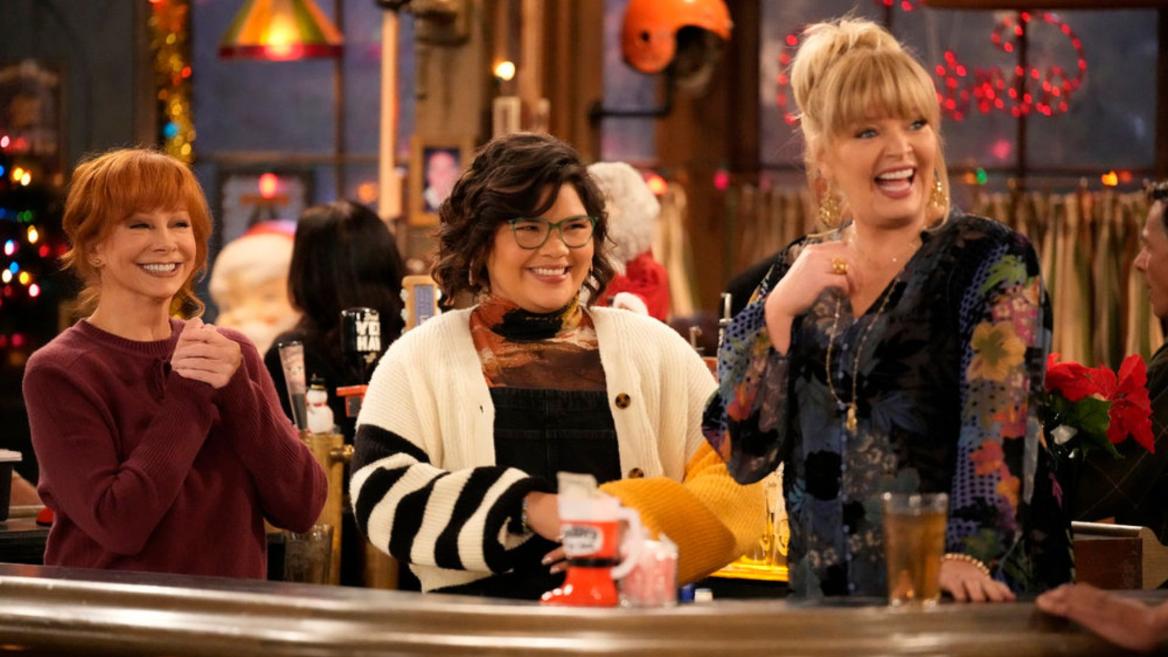 HAPPY'S PLACE -- "Ho-Ho-Howey" Episode 107 -- Pictured: (l-r) Reba McEntire as Bobbie, Belissa Escobedo as Isabella, Melissa Peterman as Gabby -- (Photo by: Casey Durkin/NBC)