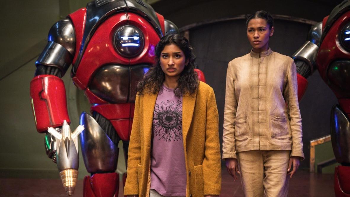 Picture Shows: Robot and Belinda Chandra (Varada Sethu) Sasha (Evelyn Miller)CREDIT: Lara Cornell/BBC Studios/Disney/Bad Wolf