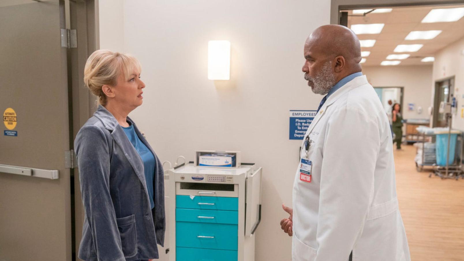 ST. DENIS MEDICAL -- "Anything to Push Zaluva" Episode 116 -- Pictured: (l-r) Wendi Mclendon Covey as Joyce, David Alan Grier as Dr. Ron -- (Photo by: Ron Batzdorff/NBC)
