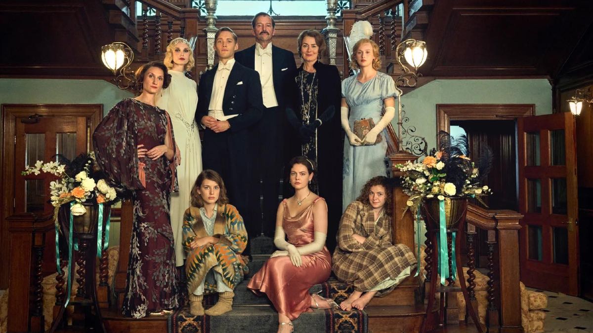 Bessie Carter (Nancy Mitford), Joanna Vanderham (Diana Mitford), Toby Begbo (Tom Mitford), James Purefoy (David Freeman-Mitford), Anna Chancellor (Sydney Bowles Mitford), Shannon Watson (Unity Mitford), Zoe Brough (Jessica Mitford), Isobel Jesper Jones (Pamela Mitford), and Orla Hill (Deborah Mitford) - Courtesy of BritBox
