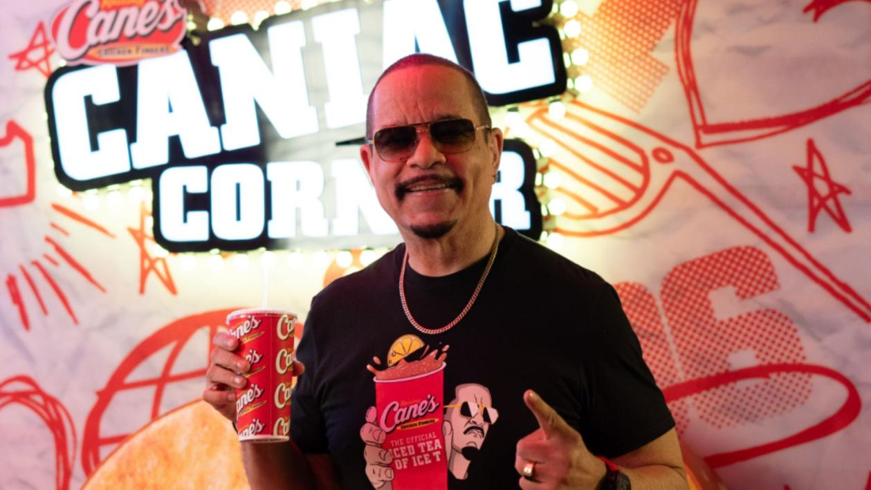 Ice T holding iced tea at Raising Cane's