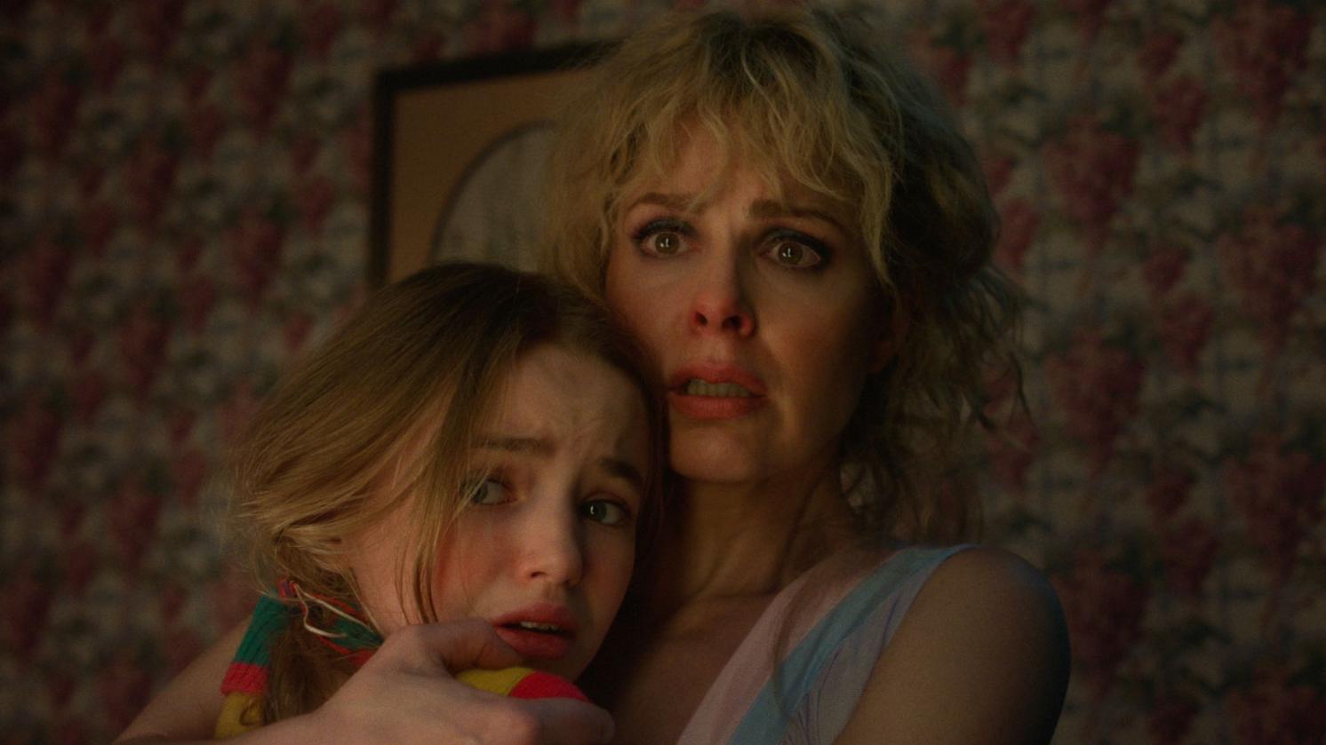 STRANGER THINGS. (L to R) Nell Fisher as Holly Wheeler and Cara Buono as Karen Wheeler in STRANGER THINGS. Cr. Courtesy of Netflix © 2025