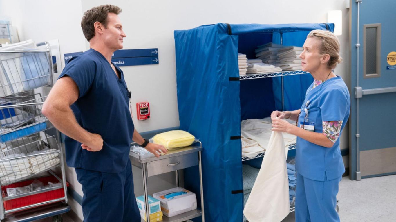 ST. DENIS MEDICAL -- "A Strong Cup Of Coffee" Episode 205 -- Pictured: (l-r) Josh Lawson as Dr. Bruce, Lauren Weedman as Pam -- (Photo by: Justin Lubin/NBC)