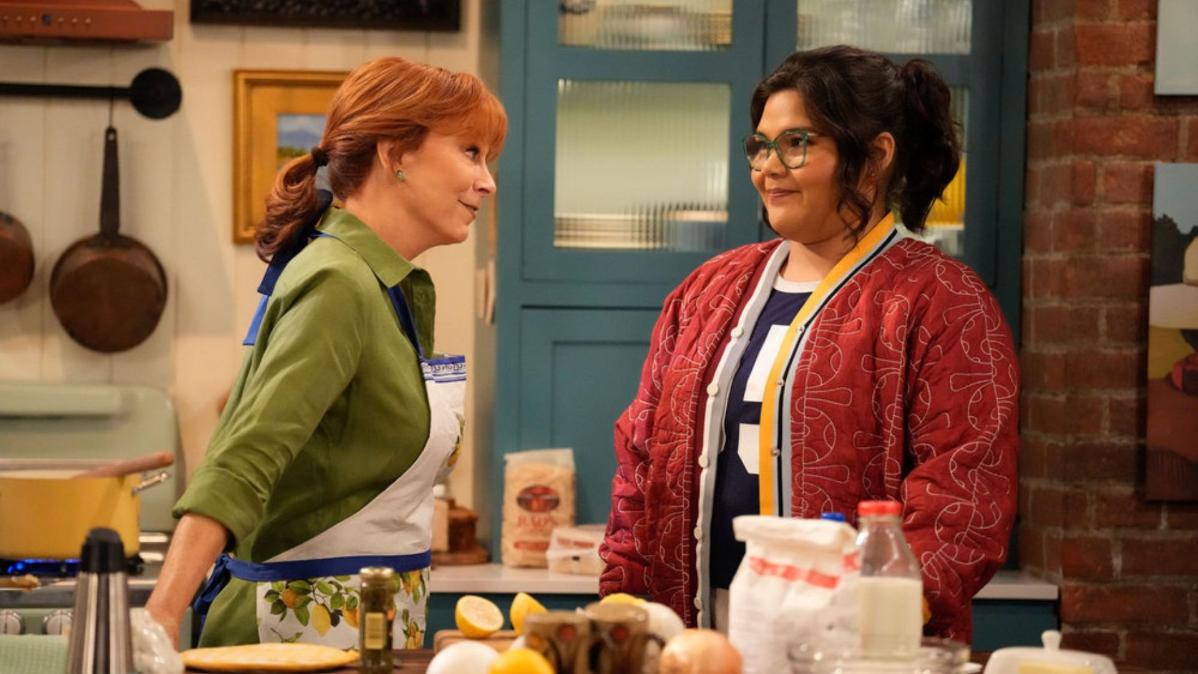 HAPPY'S PLACE -- "Silence was Golden" Episode 209 -- Pictured: (l-r) Reba McEntire as Bobbie, Belissa Escobedo as Isabella -- (Photo by: Casey Durkin/NBC)