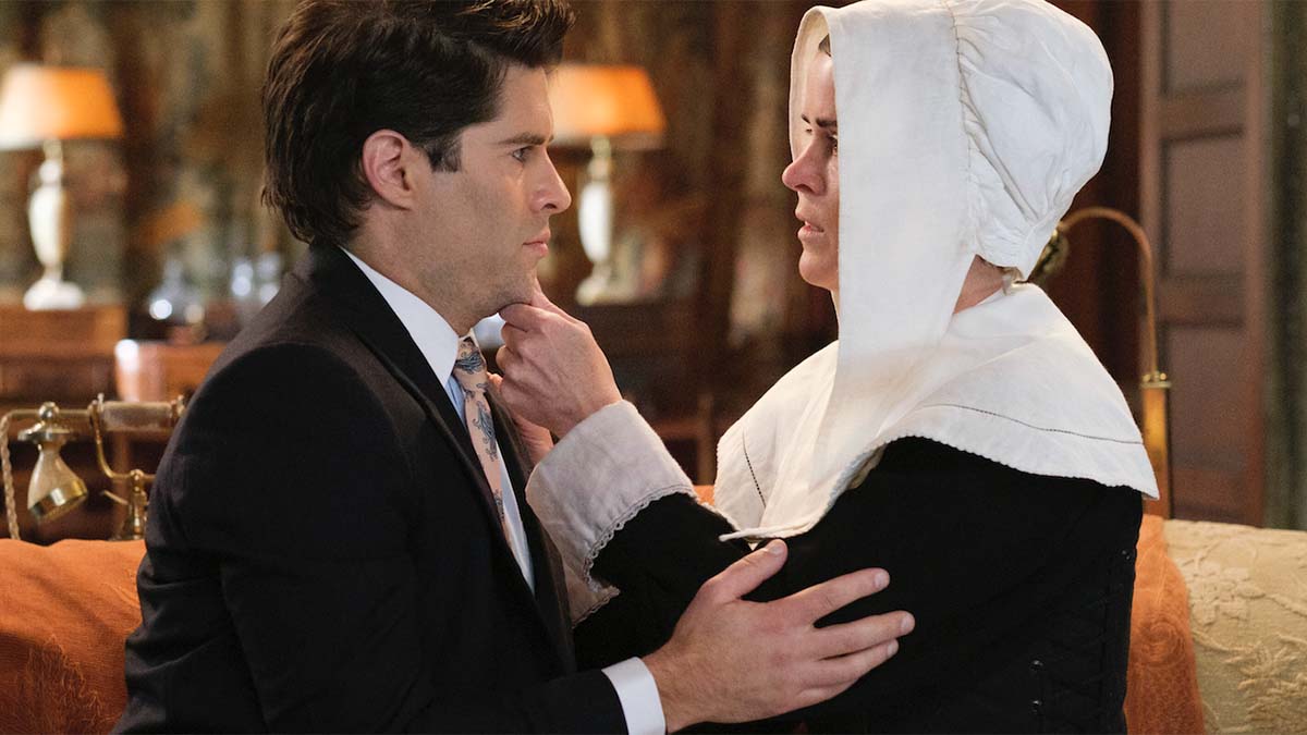 Patience holds Trevor's chin and tells him she'll never leave him in Ghosts Season 5.