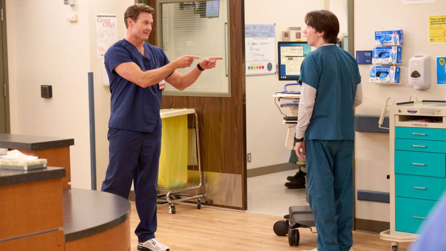 ST. DENIS MEDICAL -- "A New Best Friend" Episode 213 -- Pictured: (l-r) Mekki Leeper as Matt, Josh Lawson as Bruce -- (Photo by: Greg Gayne/NBC)