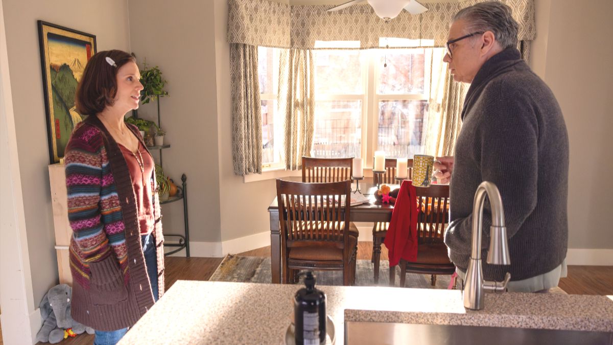 Alexis Hyatt as Young Susan and Oliver Platt as Daniel Charles in Chicago Med season 11 episode 17. (Photo Credit: Courtesy of NBC.)